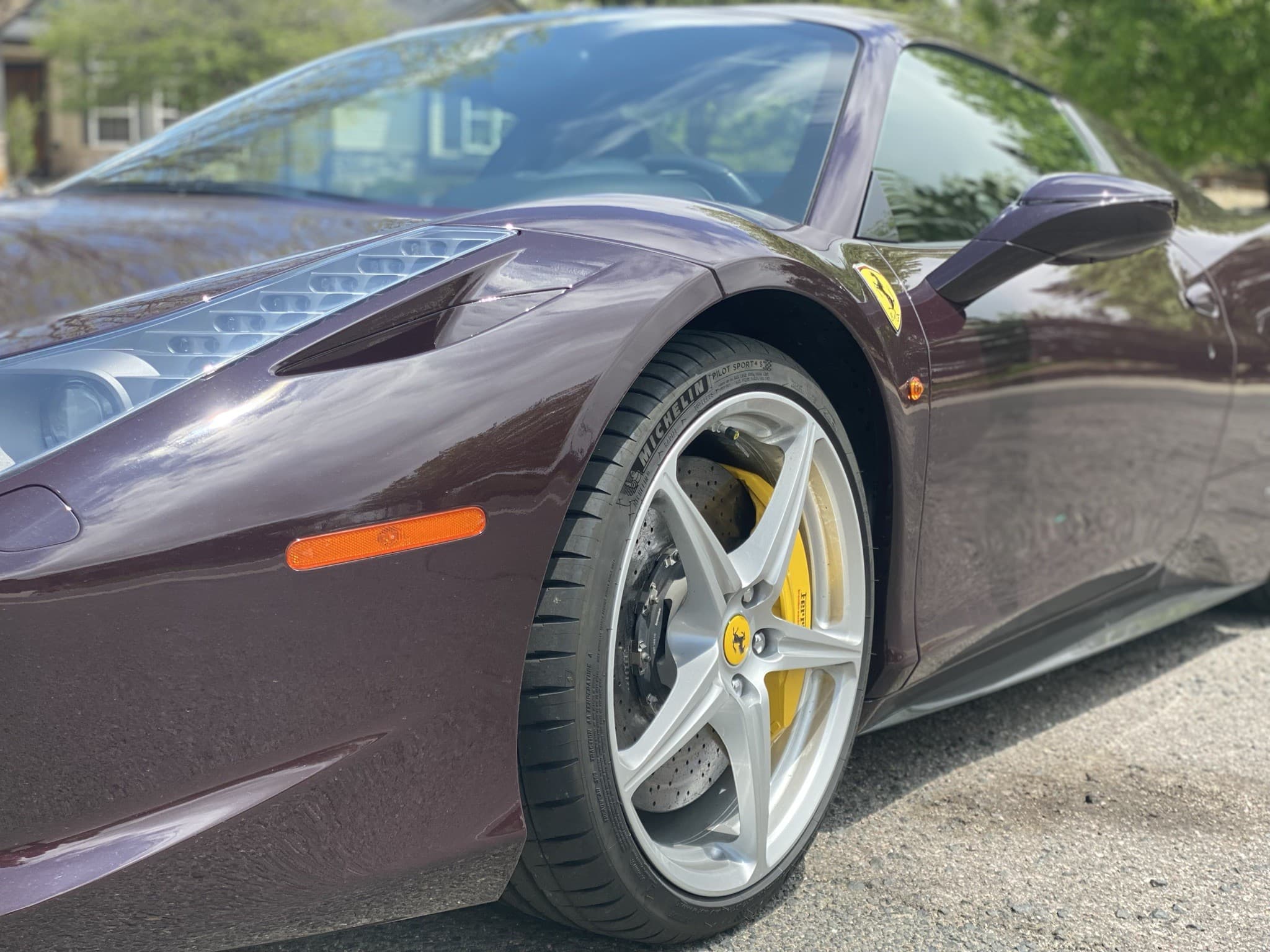 Deep purple Ferrari 458 Spider profile view