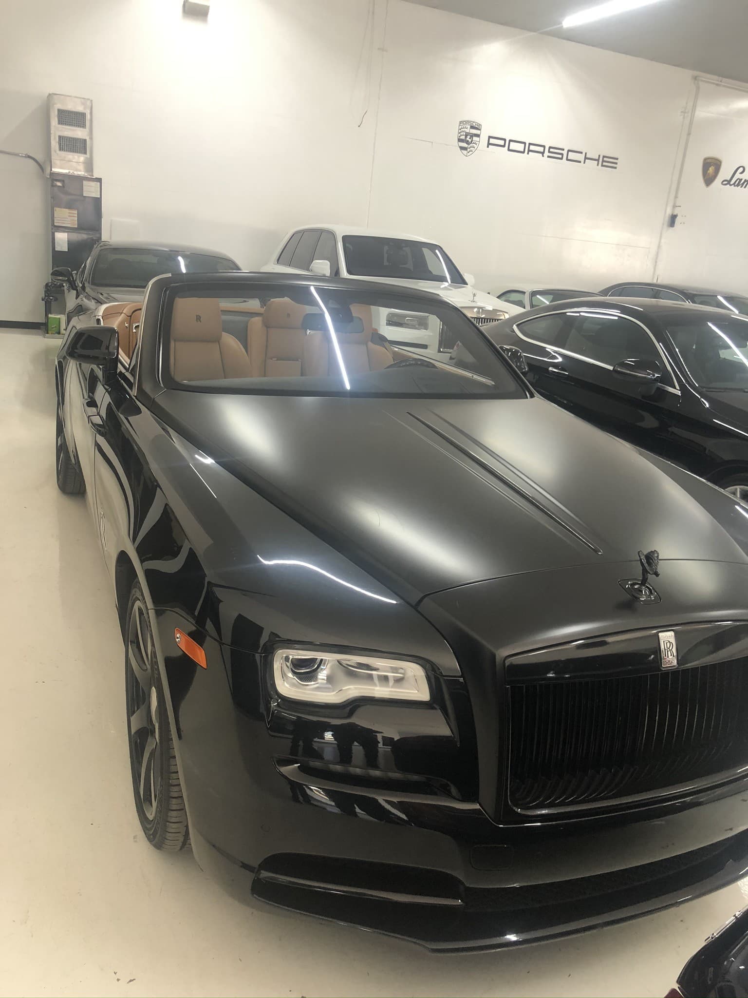 Rolls-Royce Dawn convertible top-down, three-quarter view